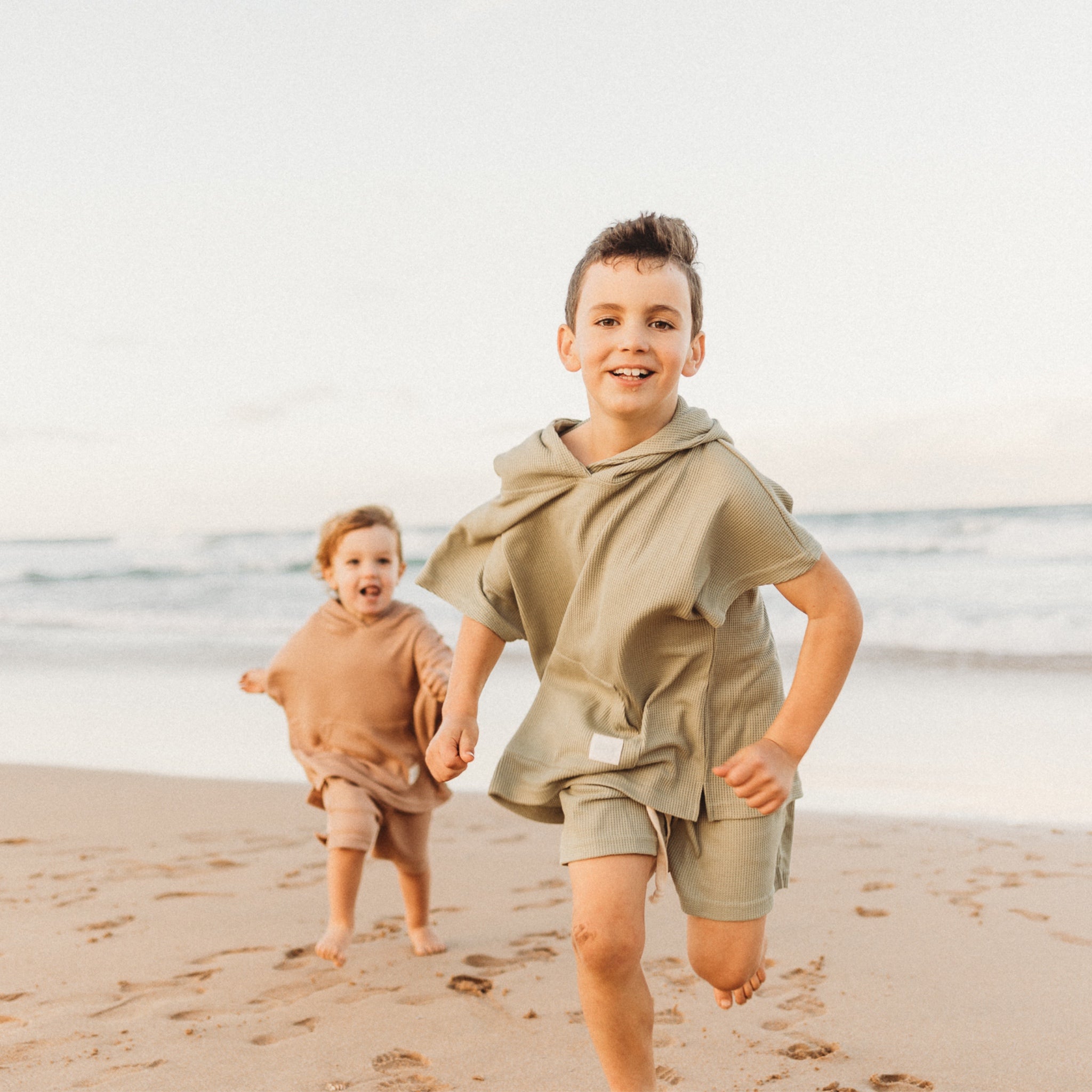 boy running in Hooded Towel set