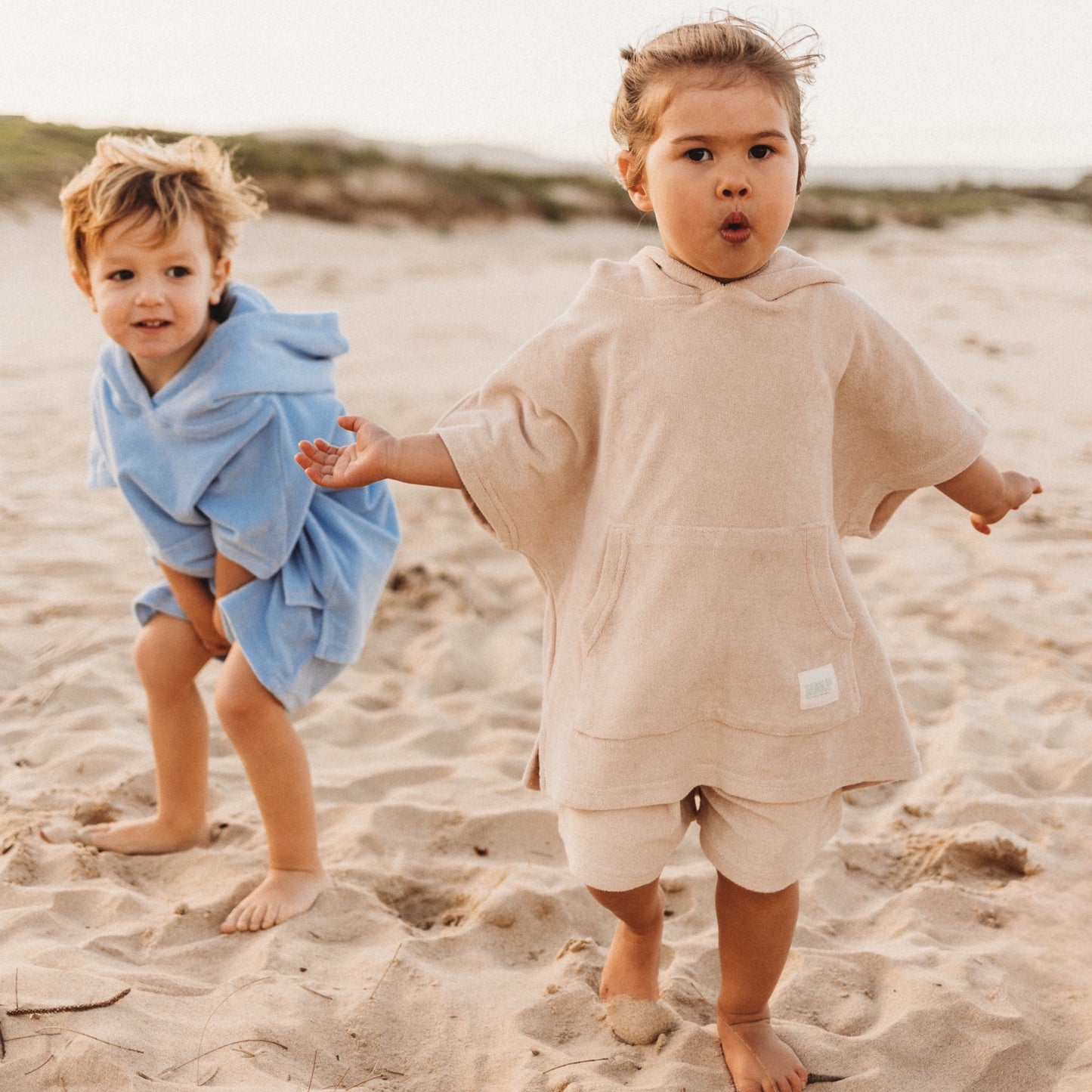 Toddlers in Sand and Blue Rugii set